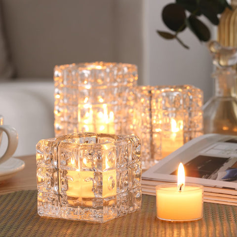 Qinxiang wedding centerpiece with ivory tea lights in clear cups