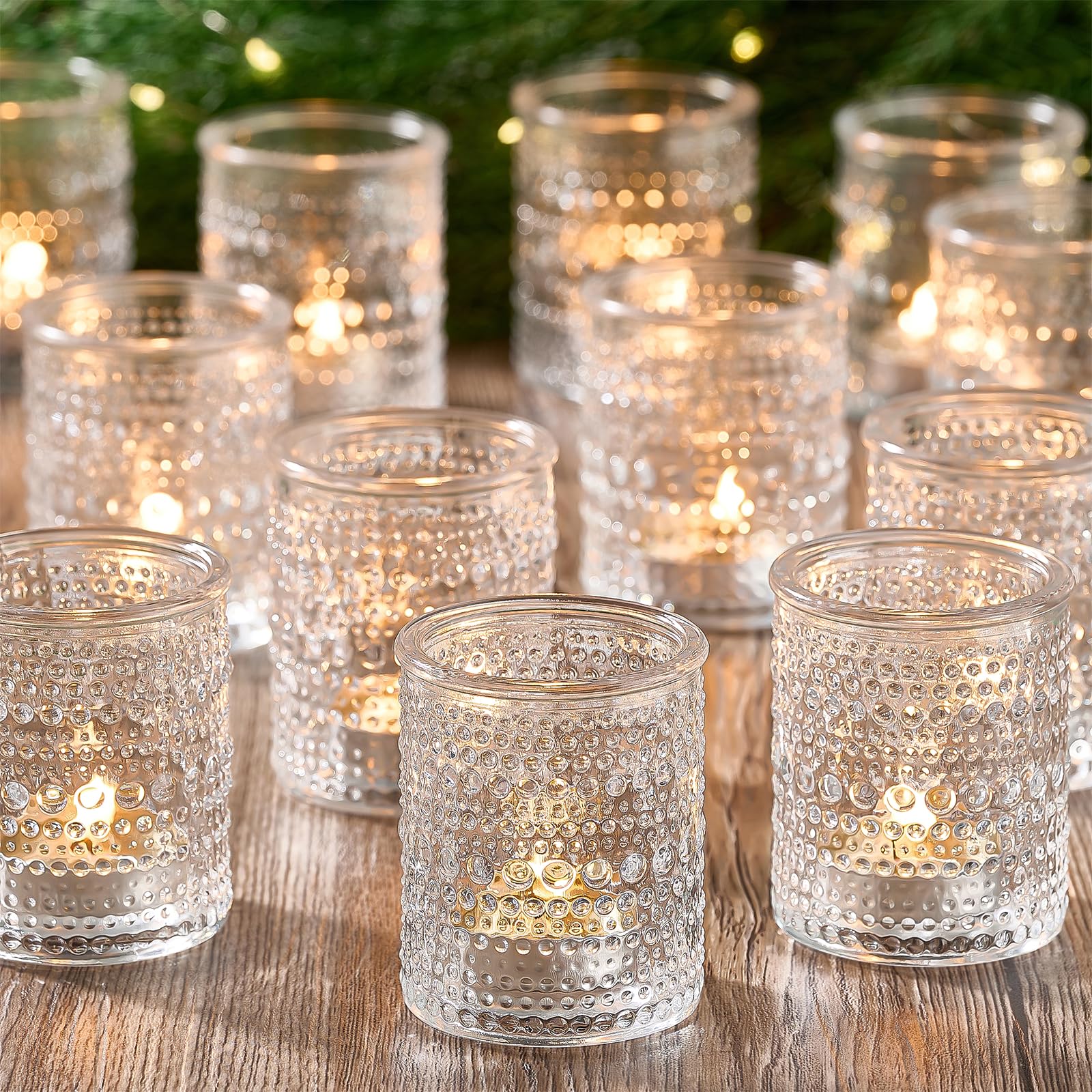 Qipecedm 24-pack clear glass votive holders for elegant table decor.