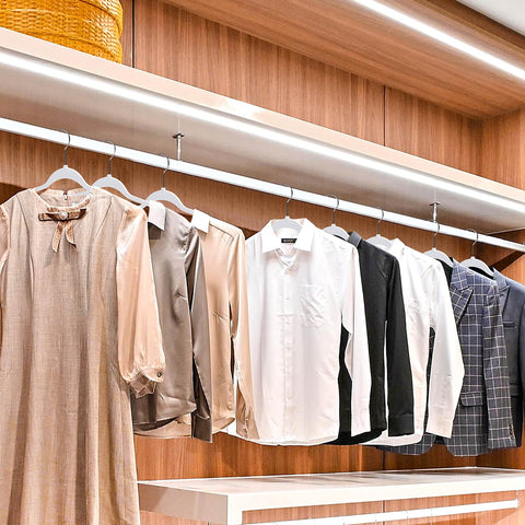 Quality Hangers nonslip notches secure blouses and shirts.