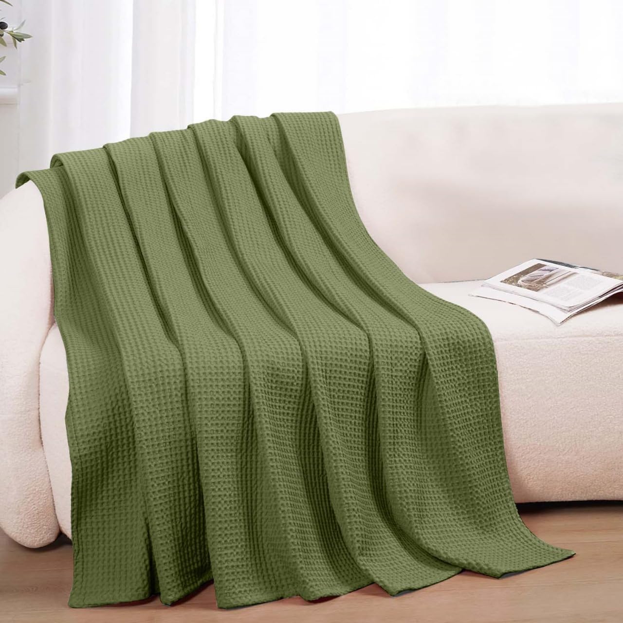 QUBA LINEN olive blanket adds subtle luxury to bedroom decor with soothing tone