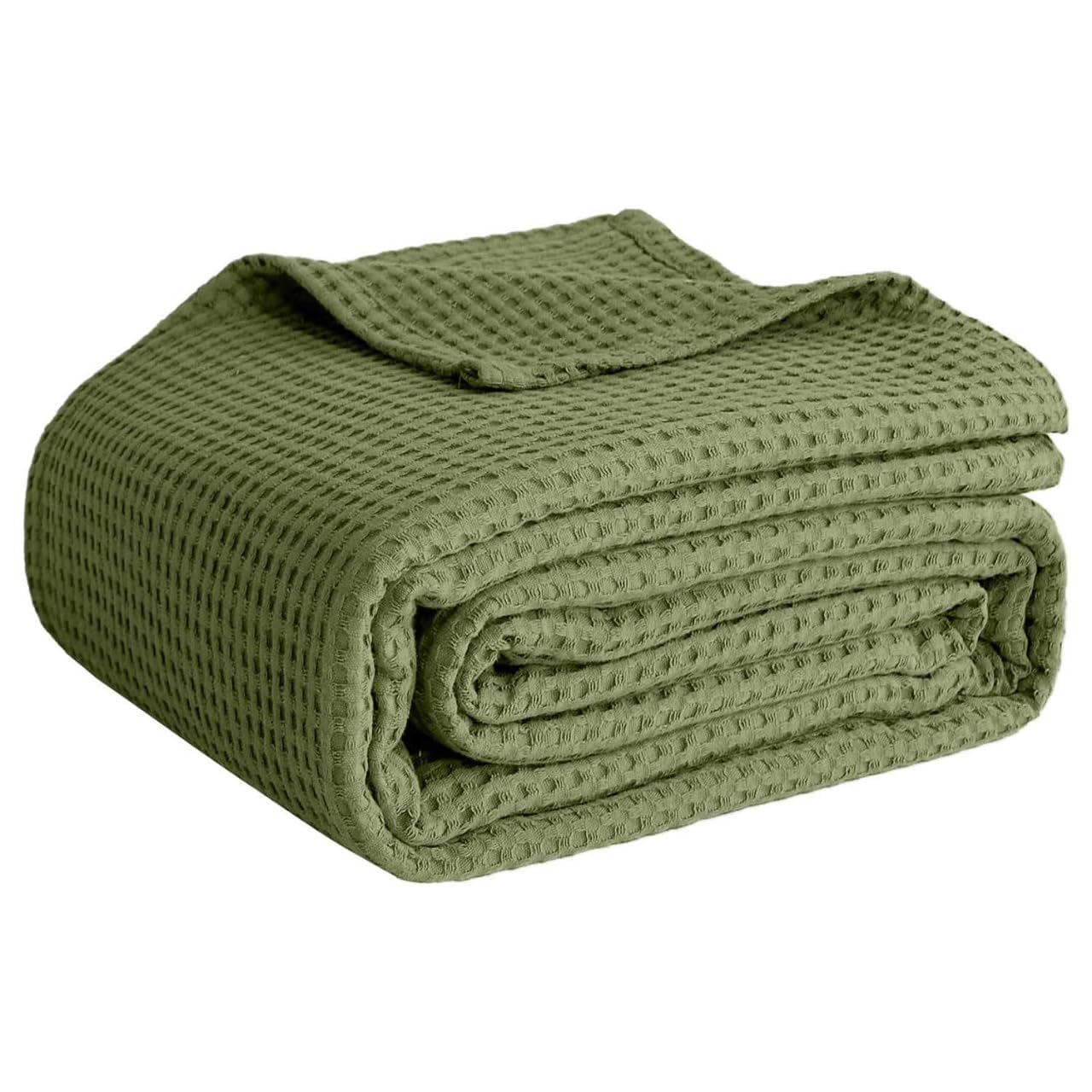 QUBA LINEN olive green waffle weave blanket on a queen bed for year-round comfort
