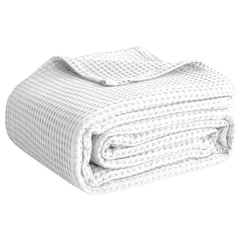 QUBA LINEN waffle blanket close-up texture shows breathable cotton weave for summer comfort.