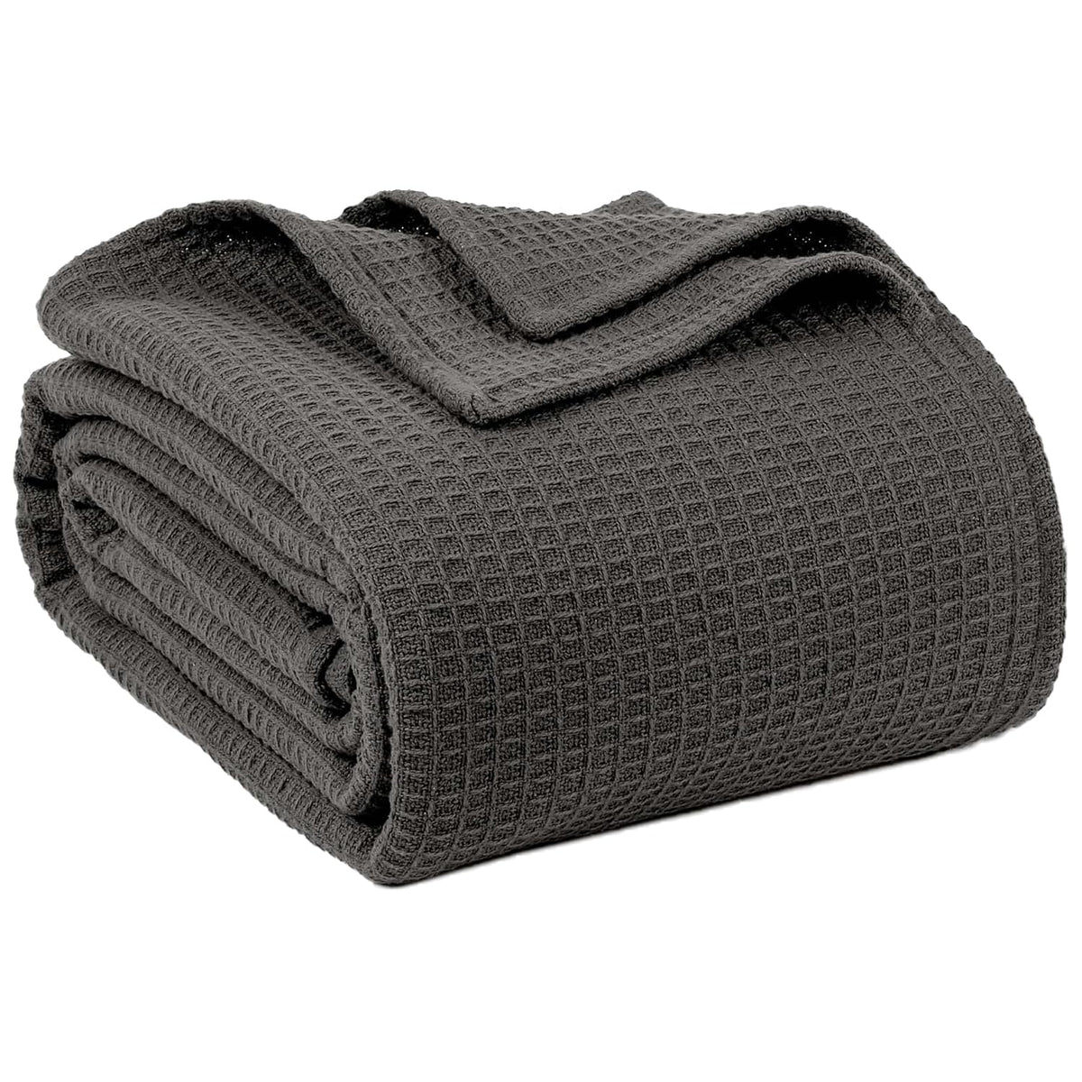 QUBA LINEN waffle blanket in dark grey on king bed, ideal for year-round warmth.