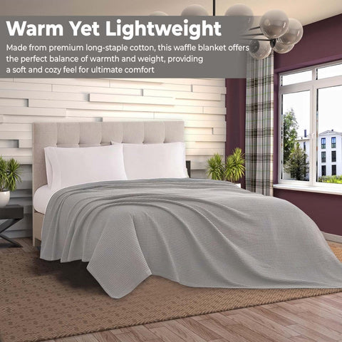 QUBA LINEN waffle blanket folded on a queen bed