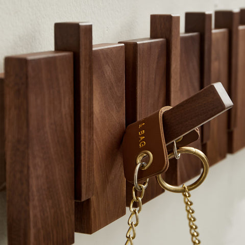 QUELLANCE easy-installation kit for wall-mounted coat hooks simplifies setup