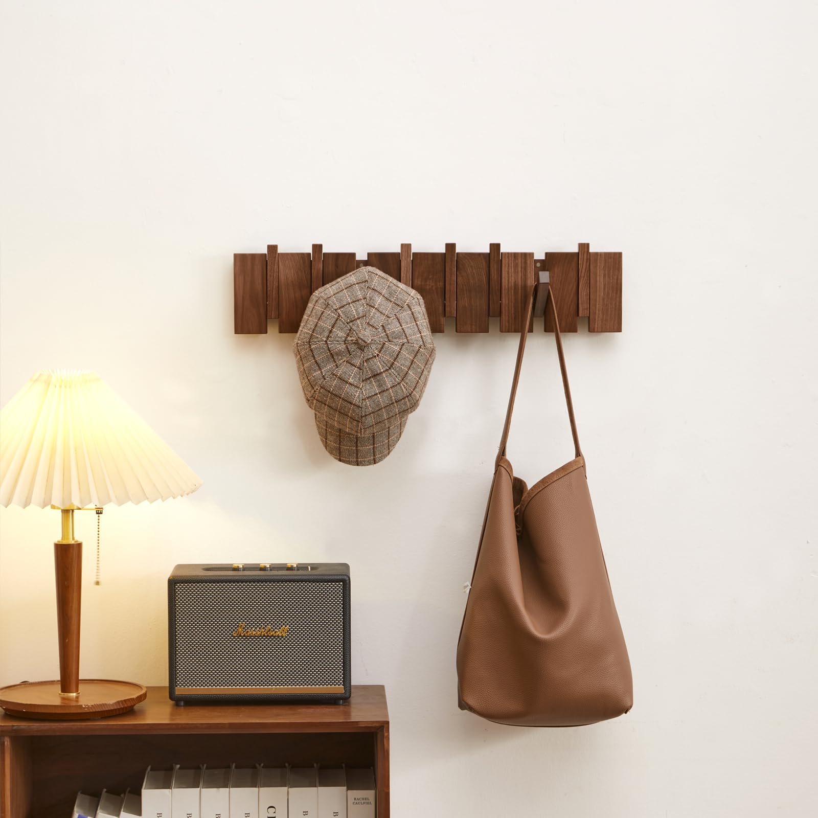 QUELLANCE 6 flip-down hooks extend hanging capacity while staying neatly tucked.