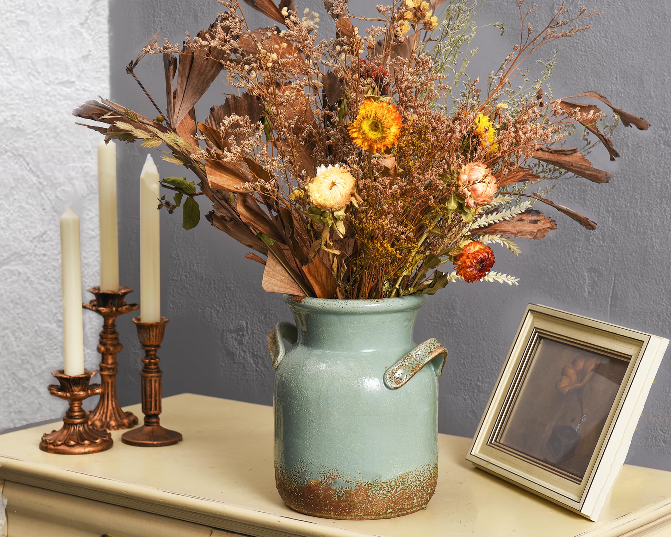 Quoowiit vase in kitchen or office provides organization with decorative appeal.
