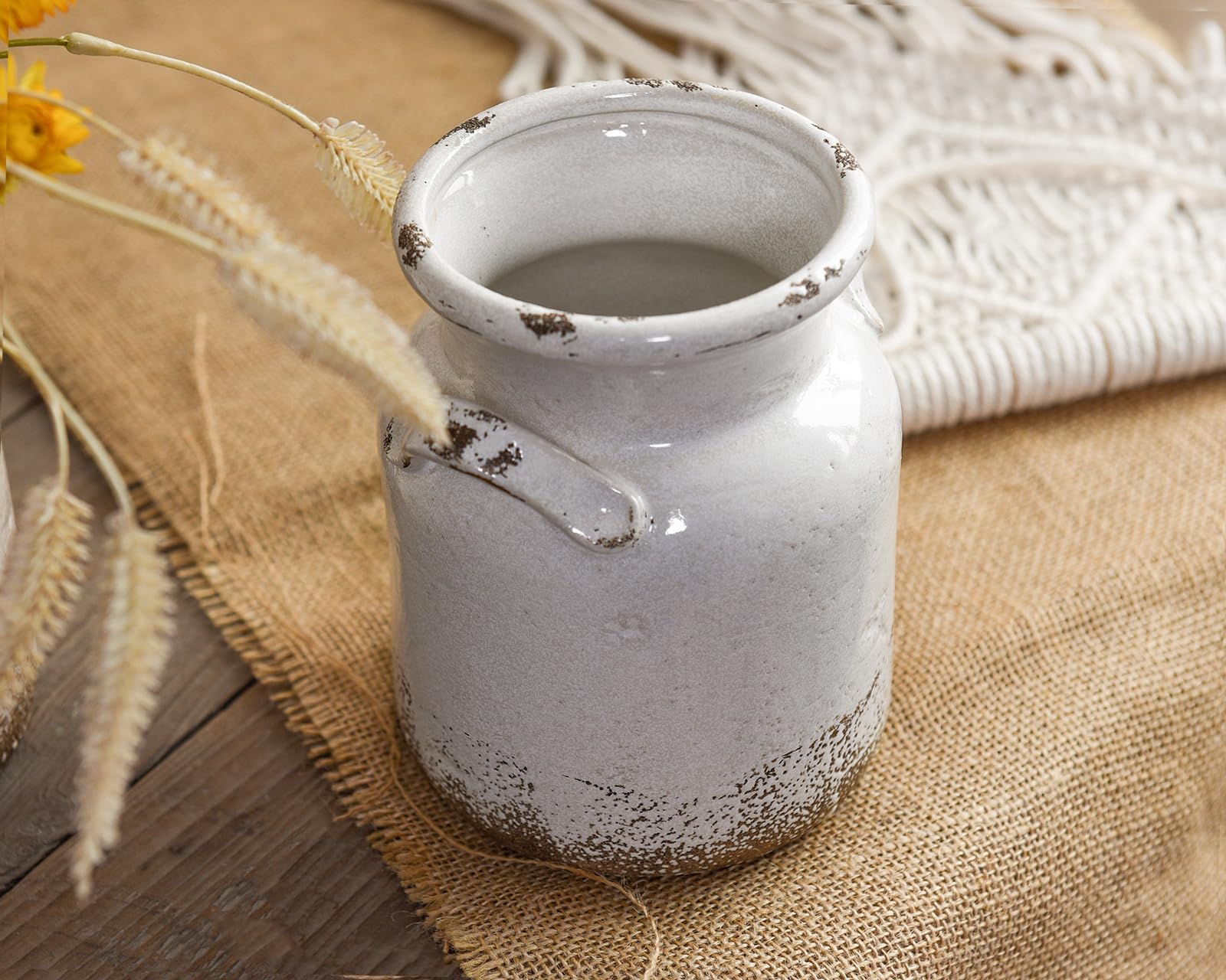 Quoowiit vintage-distressed-finish vase adds character to a modern room.