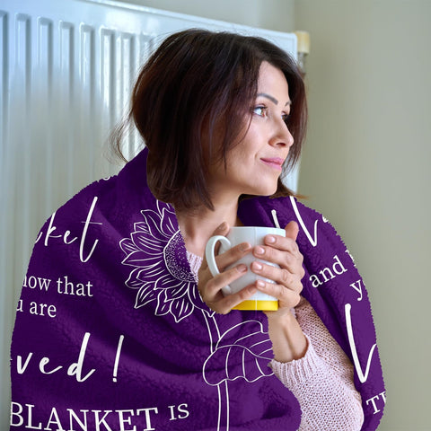 Rakoviol Hug Blanket with recipient suggests thoughtful get-well gifting.