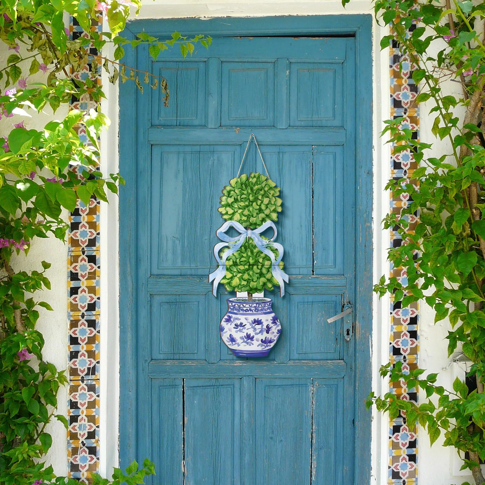 RattanView bonsai door hanger blue pot design adds color to the door.