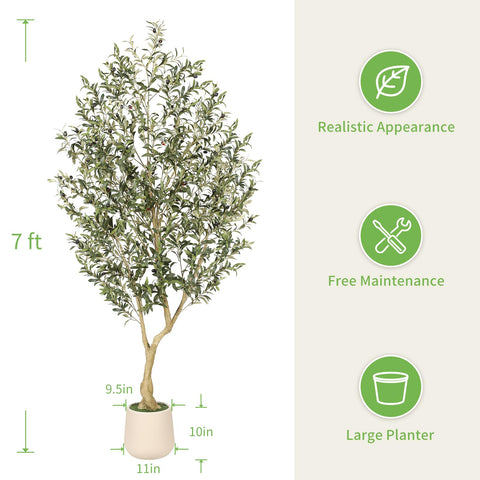 REALEAD olive tree with lifelike fruits provides natural focal point.