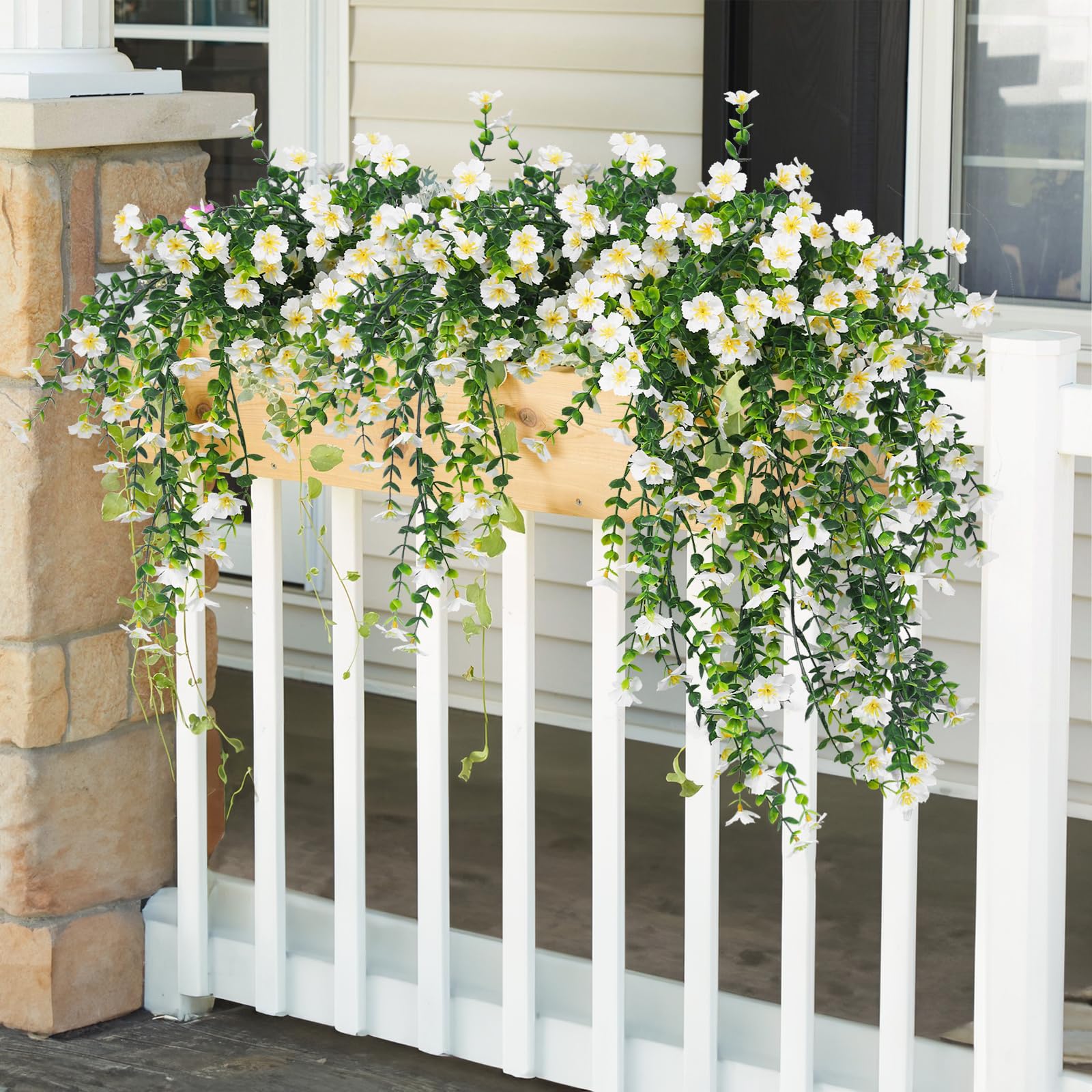 RECUTMS lifelike daisies and eucalyptus leaves elevate any doorway or wall.