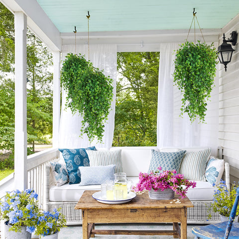RECUTMS faux eucalyptus leaves and ivy swag adds natural look to walls and porches.