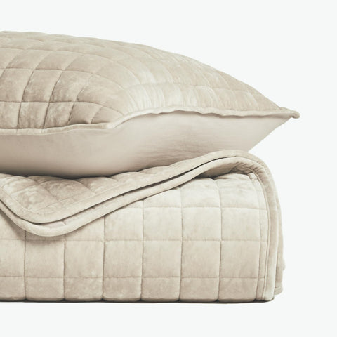 RECYCO down-alternative filling provides warmth without heaviness for year-round comfort.