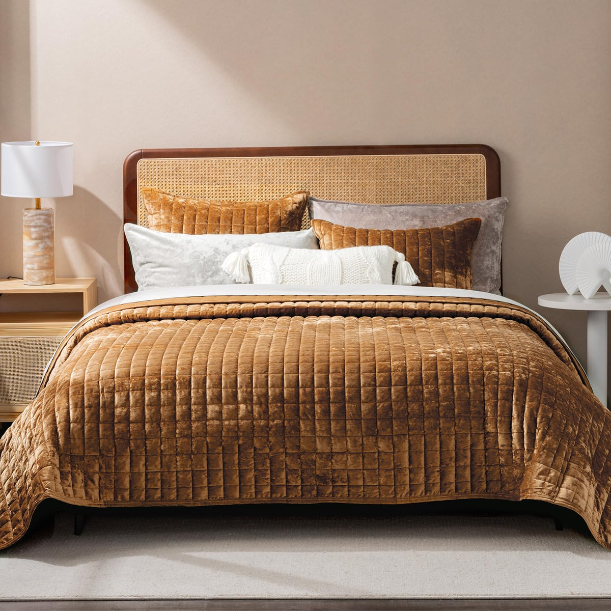 RECYCO luxury velvet quilt set in caramel gold folded on bed offers timeless elegance.