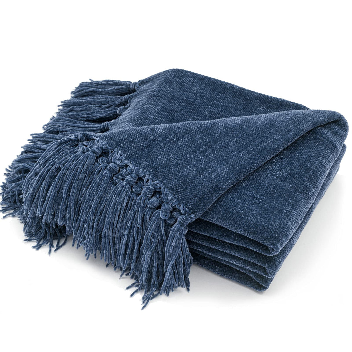 RECYCO blue fringe throw blanket draped over sofa for cozy seating