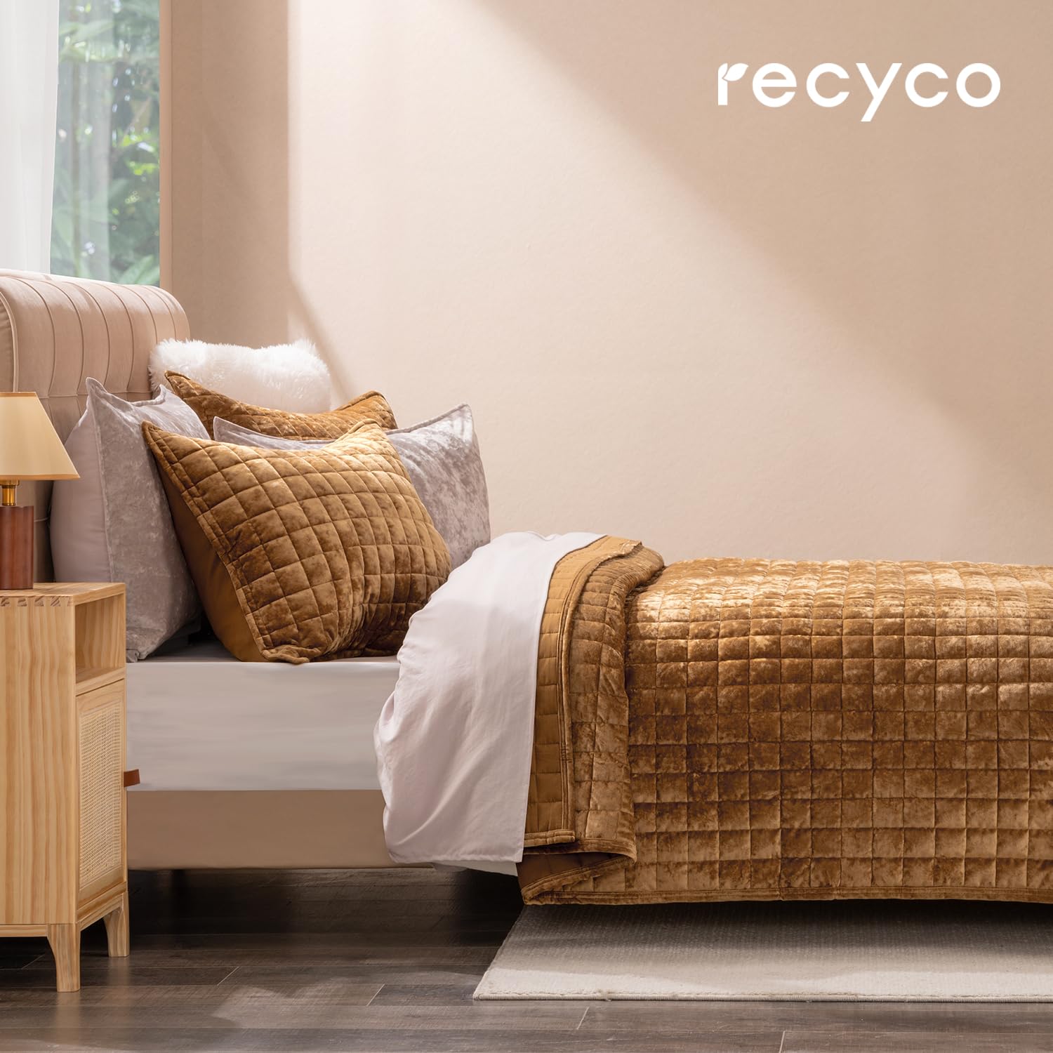 RECYCO velvet comforter close-up shows ultra-soft texture and premium fabric.