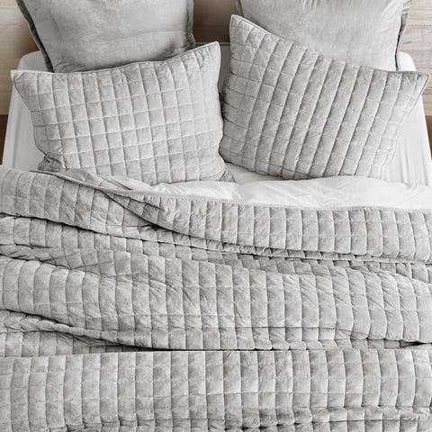 RECYCO Velvet Quilt channel-pattern highlights timeless geometry for versatile bedroom decor.