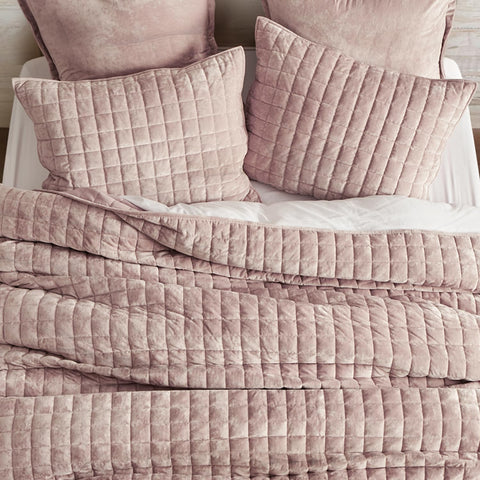 RECYCO velvet quilt set with two shams arranged for a coordinated bed setup.