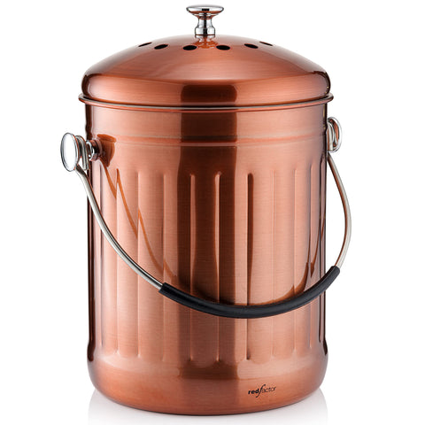 RED FACTOR compost bin on countertop with dual filters to reduce odors.