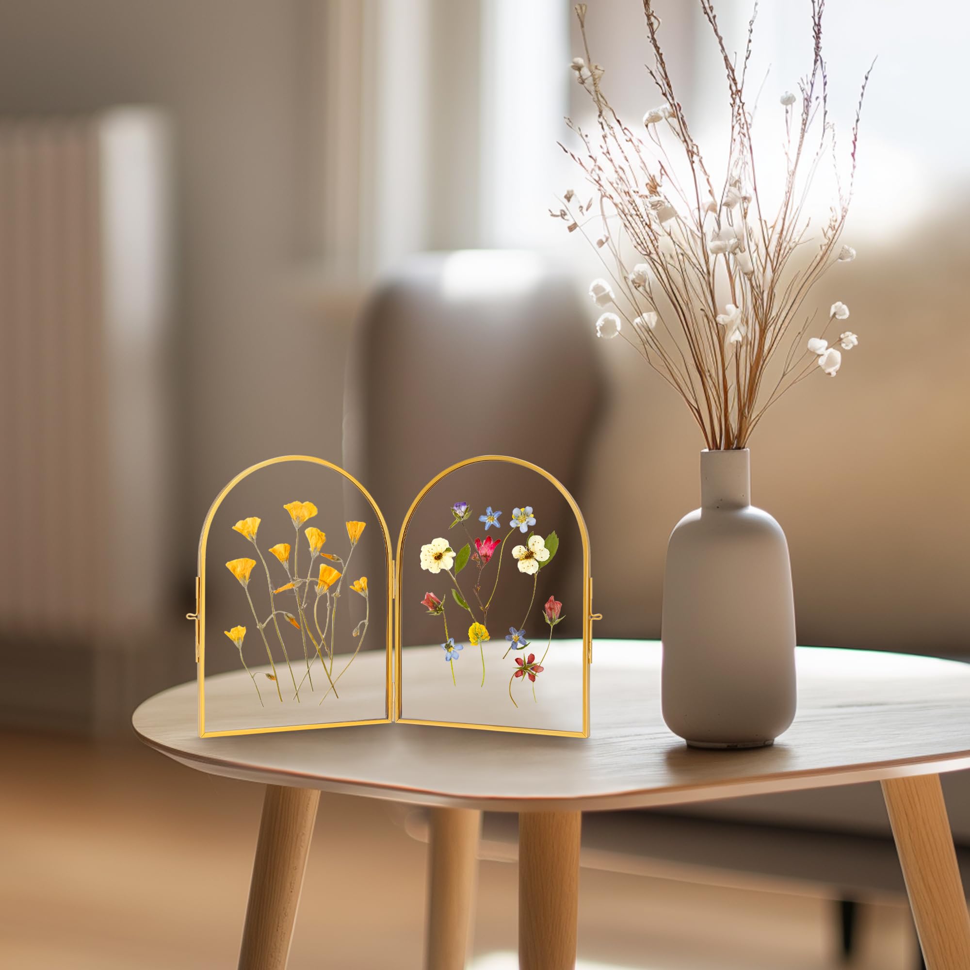 REDHUGO brass and glass frame offers durable, lasting display for keepsakes.