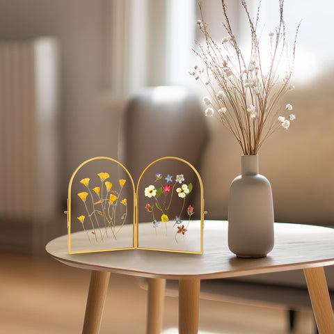 REDHUGO brass and glass frame offers durable, lasting display for keepsakes.