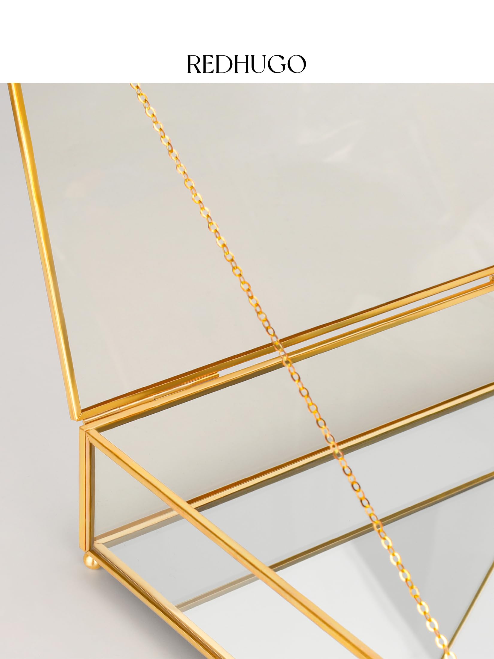 RedHUGO large glass box keeps watches and glasses neatly organized.