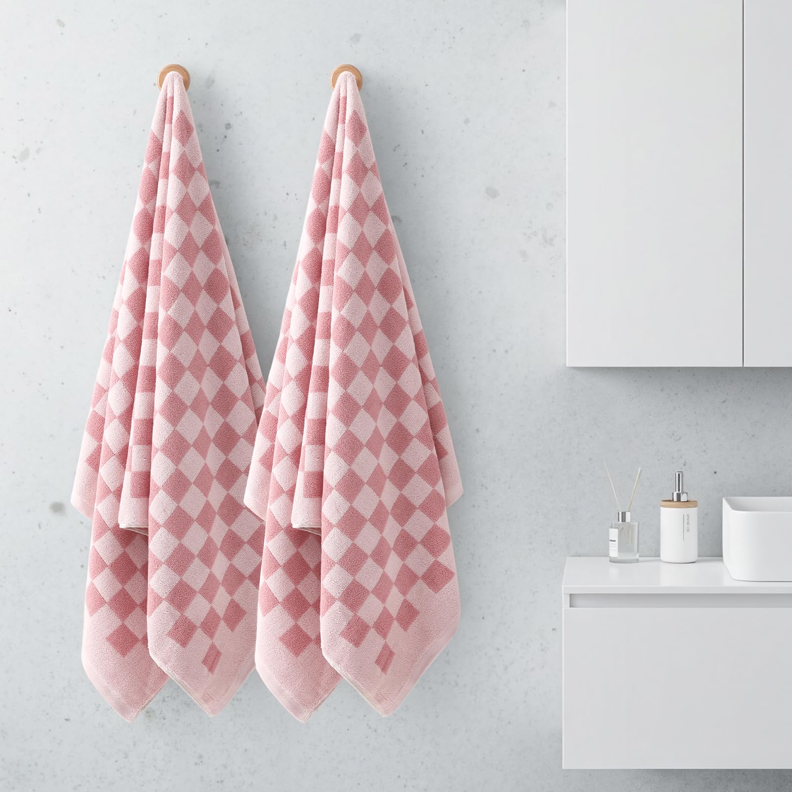 REDKISS towel used as headscarf or hair-drying accessory after shower.