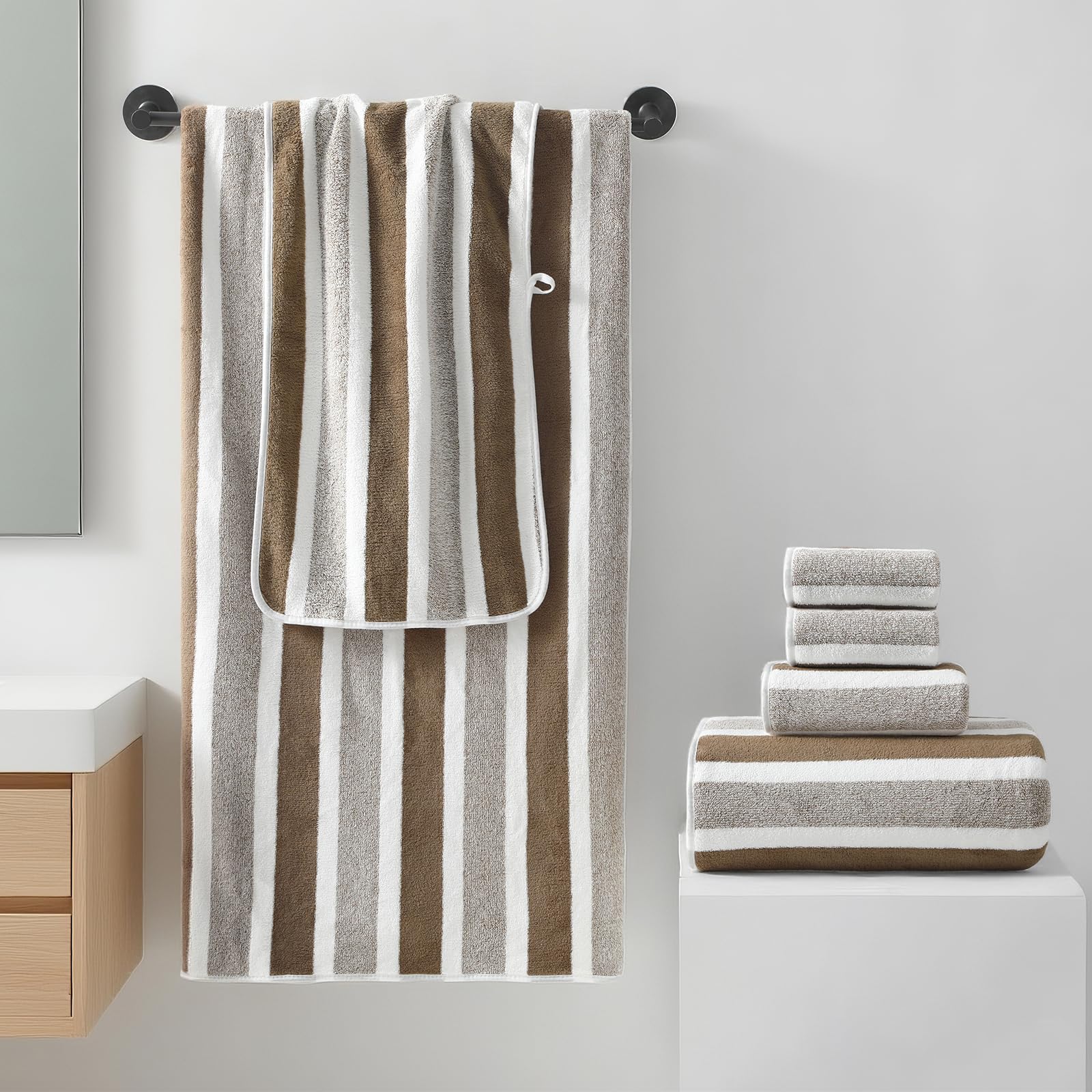 RedKISS towels folded on display showing plush microfiber feel.