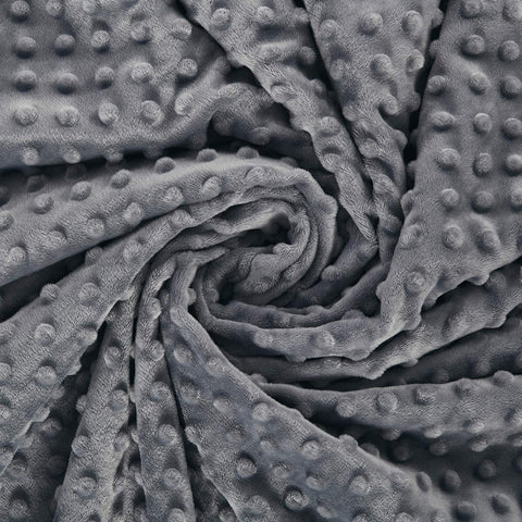 RelaxBlanket dark grey color complements modern bedroom decor.