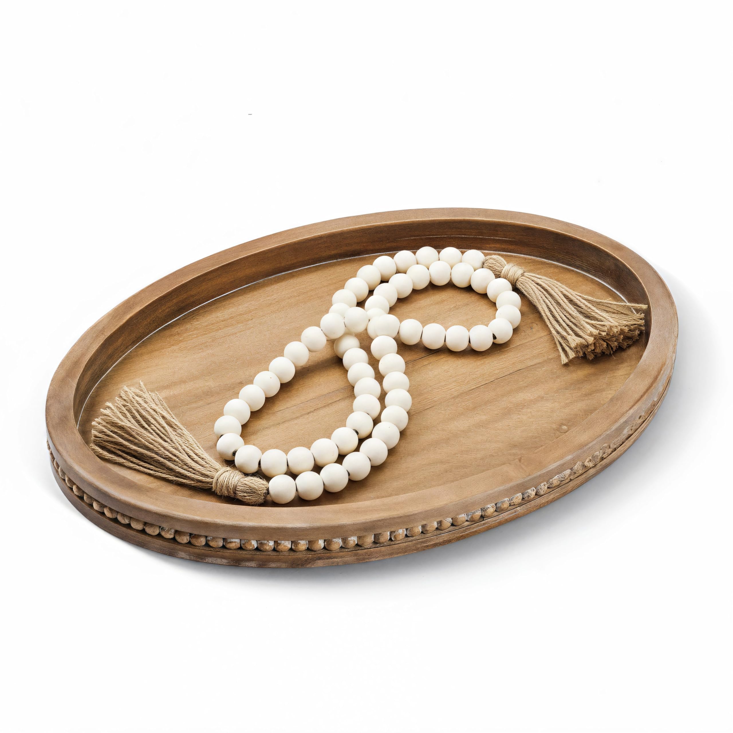Relaxing Garden oval wood tray showcases a chic coffee table centerpiece and organized surface.
