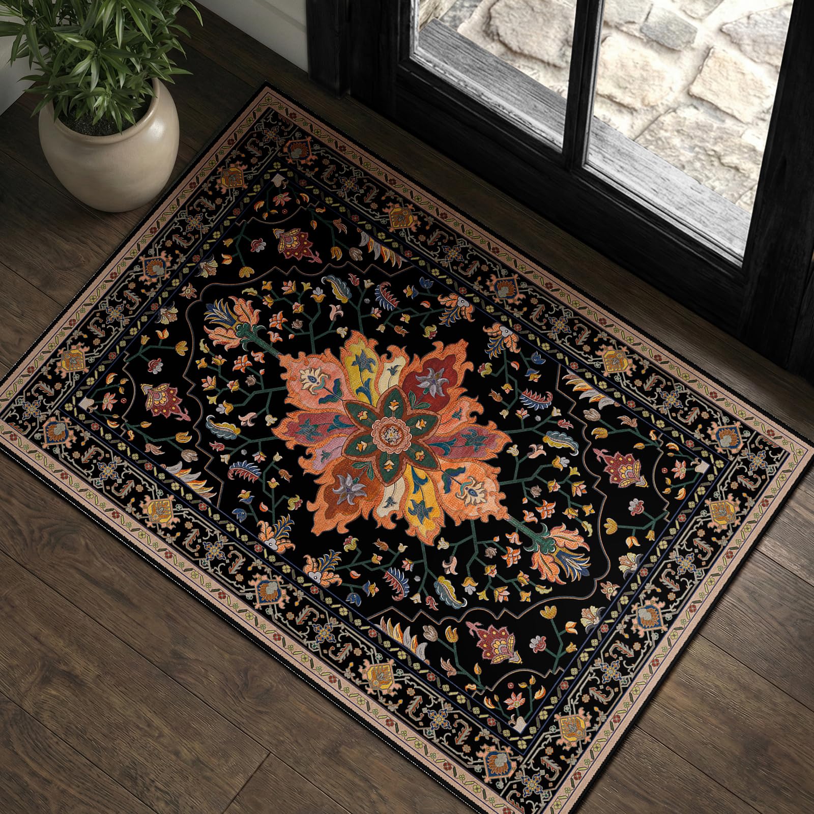 RELEANY area rug with black colorful floral pattern suitable for entryways and high-traffic areas