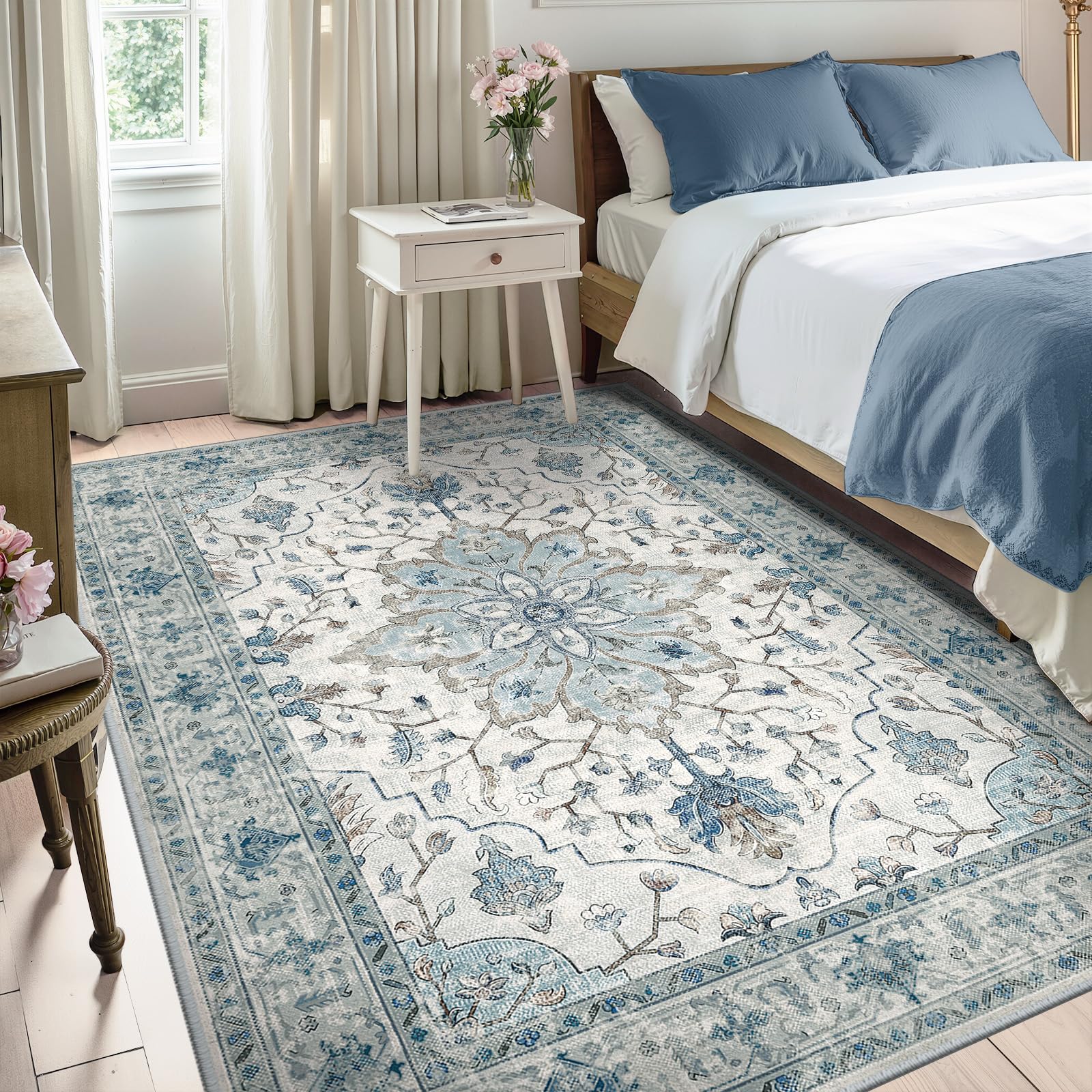 RELEANY rug with vintage medallion in navy and beige for elegant bedrooms.