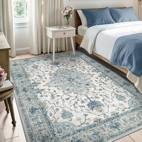 RELEANY rug with vintage medallion in navy and beige for elegant bedrooms.