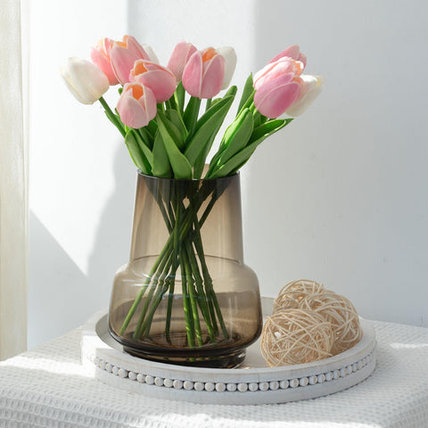 Relexome amber glass vase on dining table for a refined centerpiece