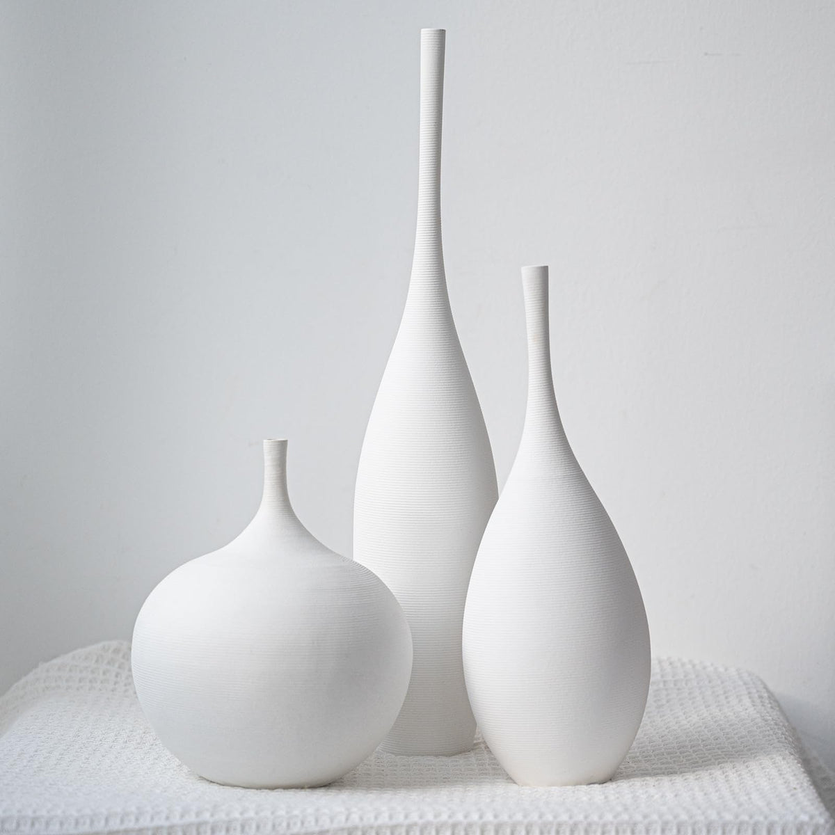 Relexome vase set top view adds calm elegance to a minimalist shelf.