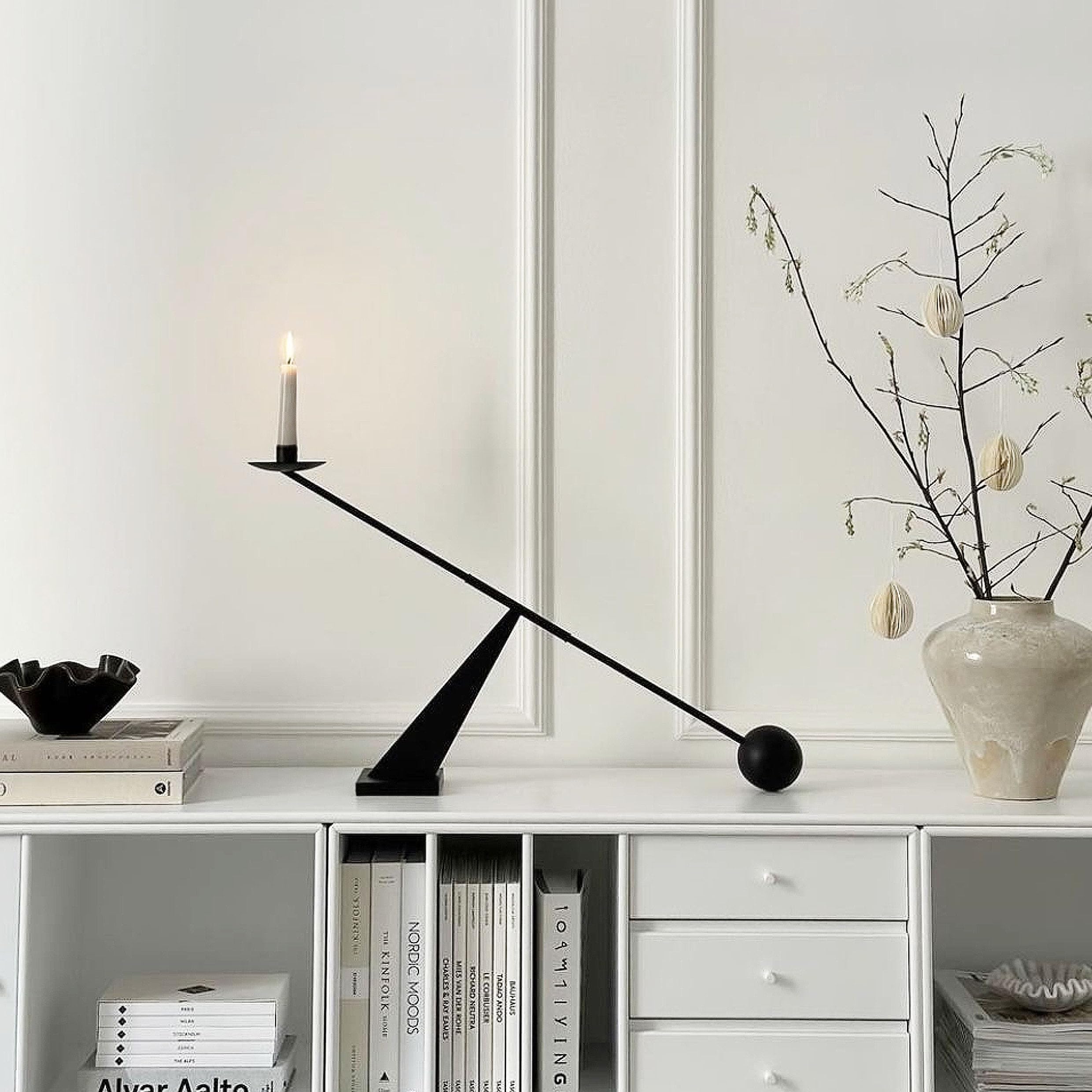 Remenna dark metal finish enhances contemporary interiors