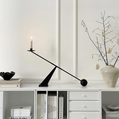 Remenna dark metal finish enhances contemporary interiors