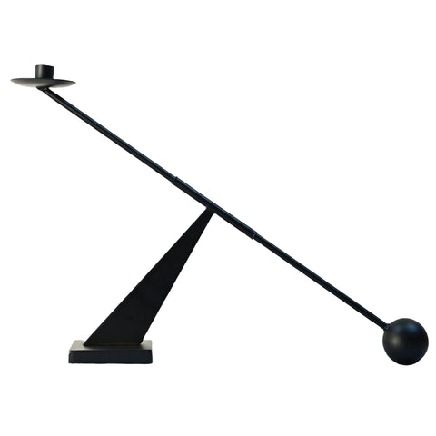 Remenna black metal candle holder with sleek silhouette for modern table decor