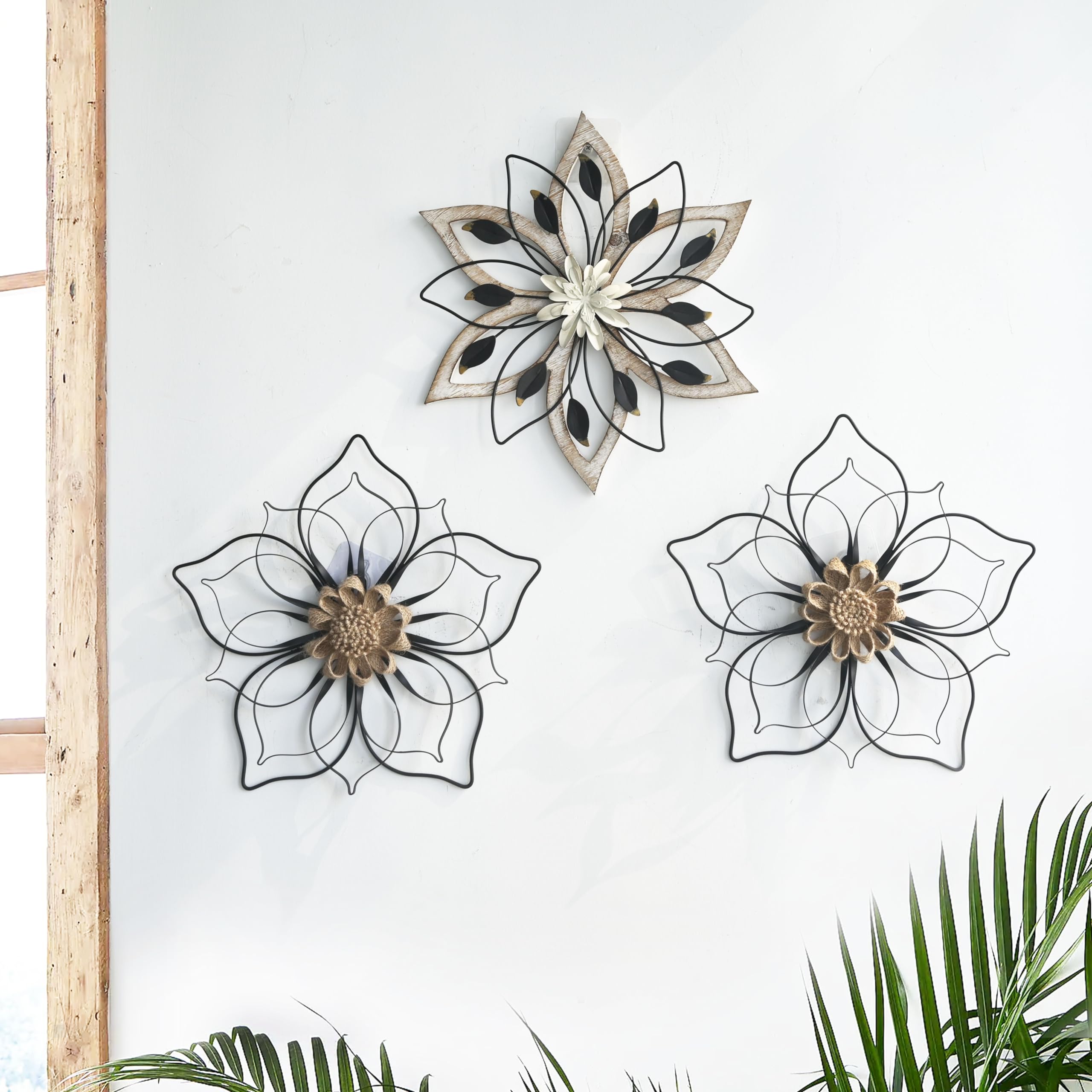 Remenna rustic metal flower wall decor blends texture and vintage appeal.