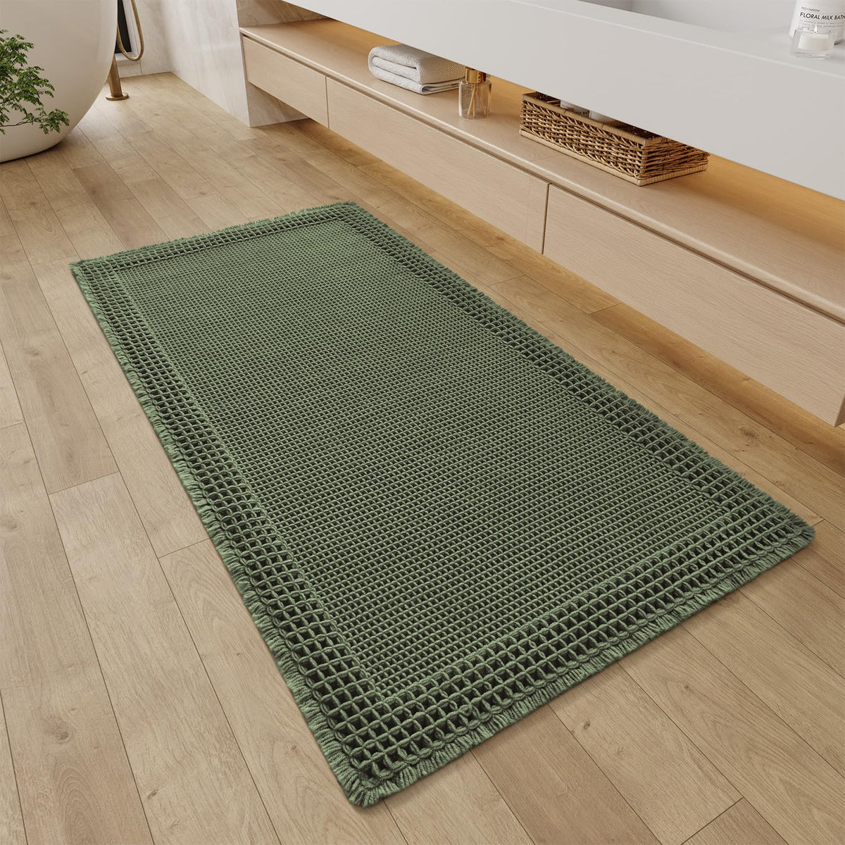RESARE Christmas waffle bathroom runner with tassels adds cozy texture to a green bath.