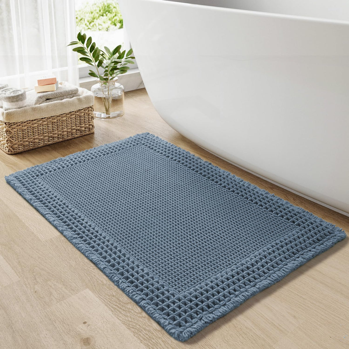 RESARE waffle bath rug texture with tassels highlighting cozy bathroom decor