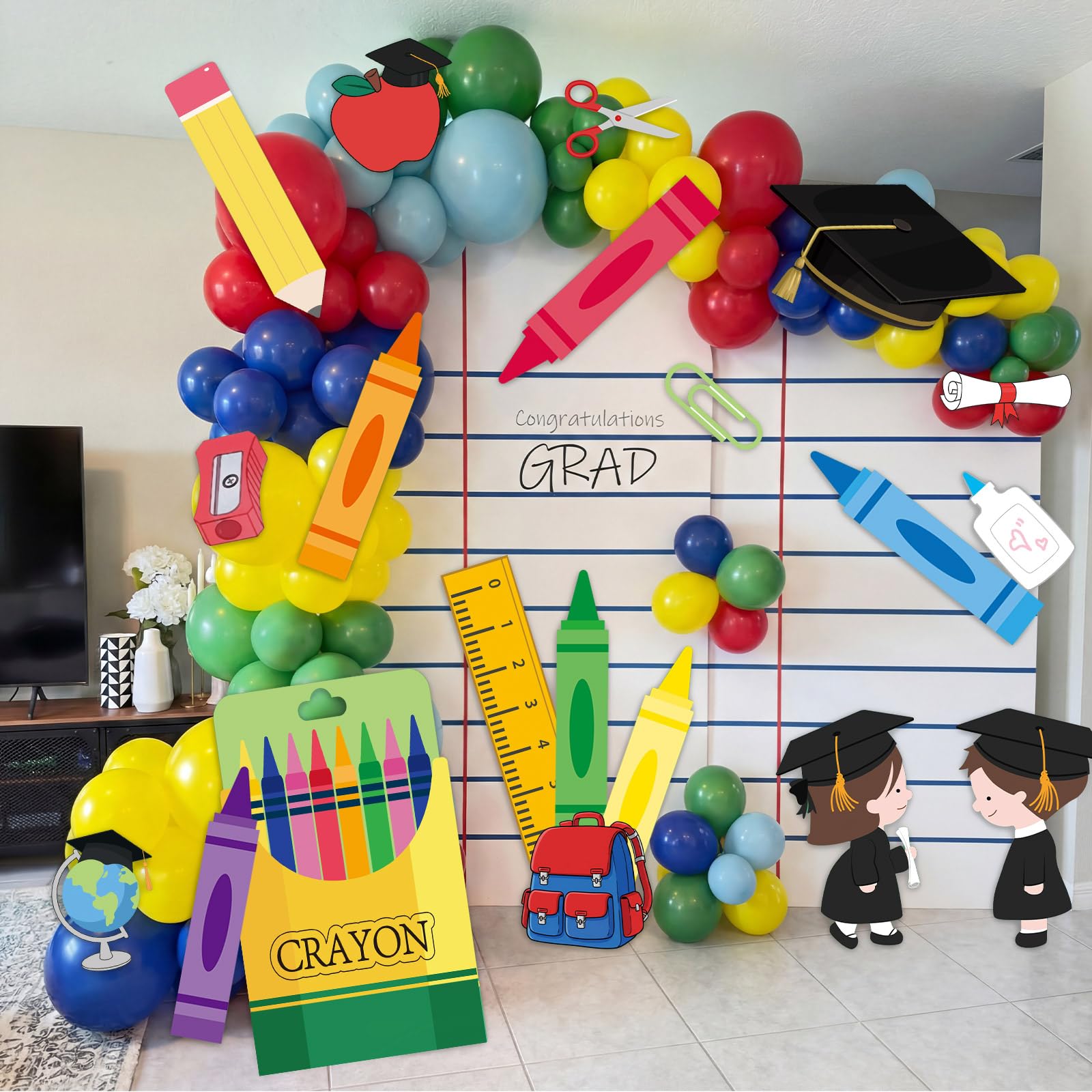 Resholder graduation cap cutout creates a focal point for classroom photos