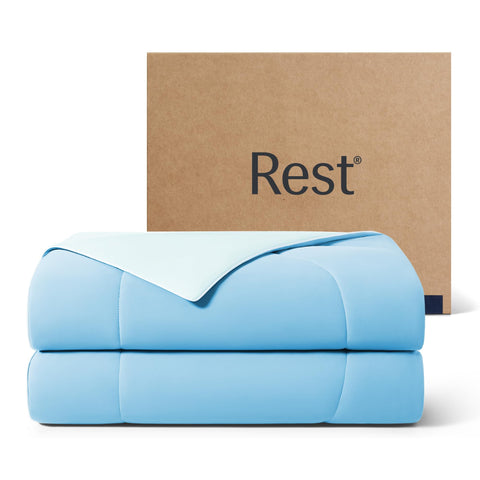 REST Evercool cooling comforter on a bed with aqua blue cover for all-season cooling