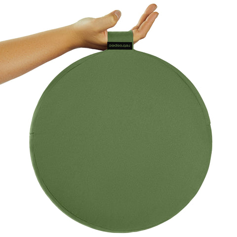 Sedona Zafu placed on a yoga mat for seated practice and grounding.