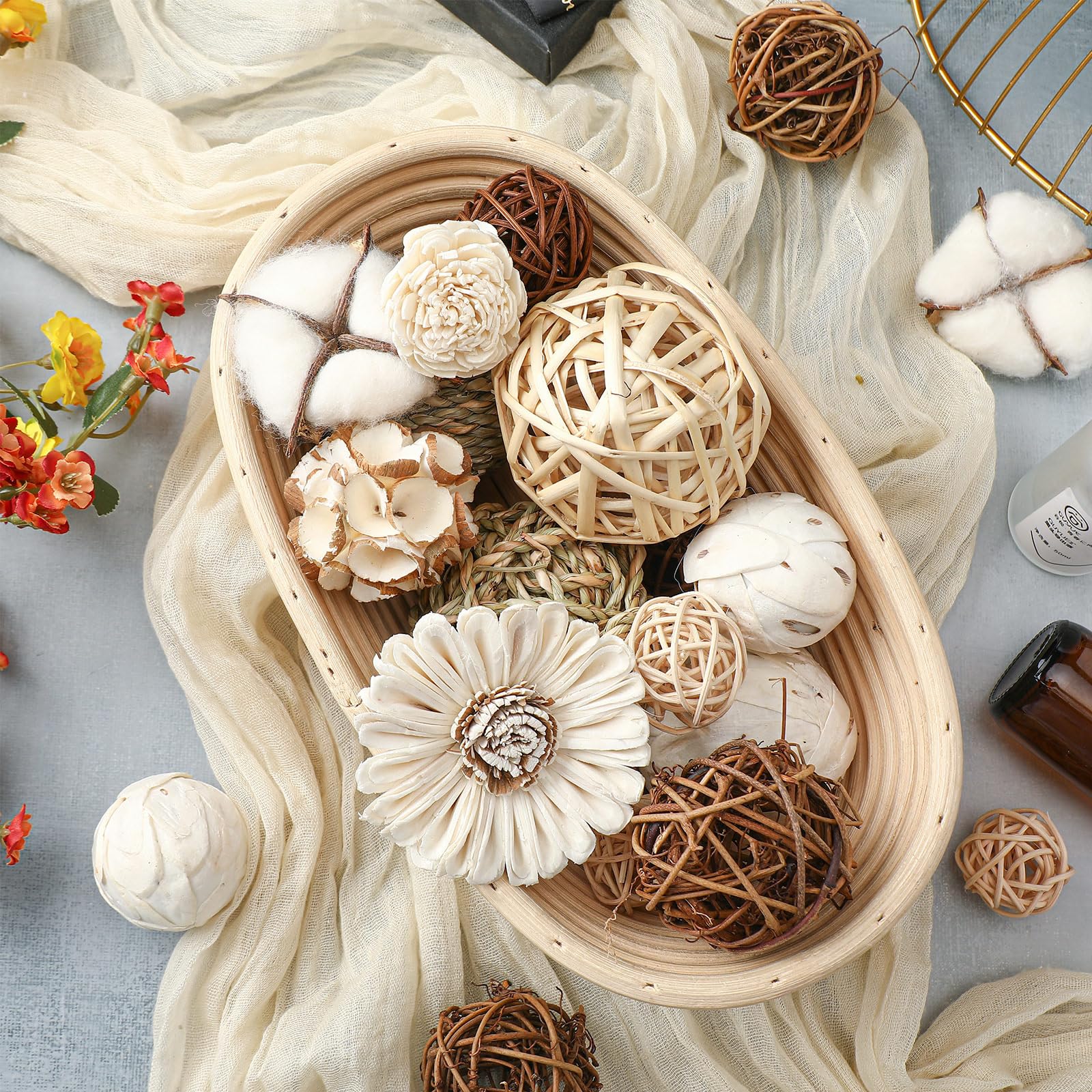Brown wicker spheres by Riceshoot, versatile for vase and tray decorations.
