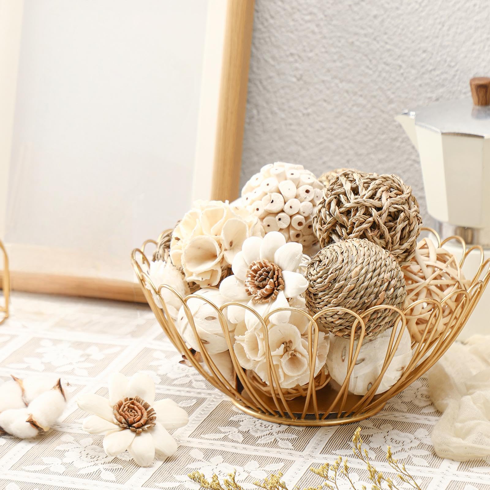 Riceshoot white decorative balls bring texture and lightness to shelves and tables.