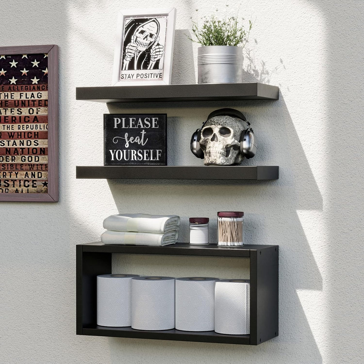 RICHER HOUSE Black Floating Shelves 3-pack over the toilet for tidy bathroom storage.