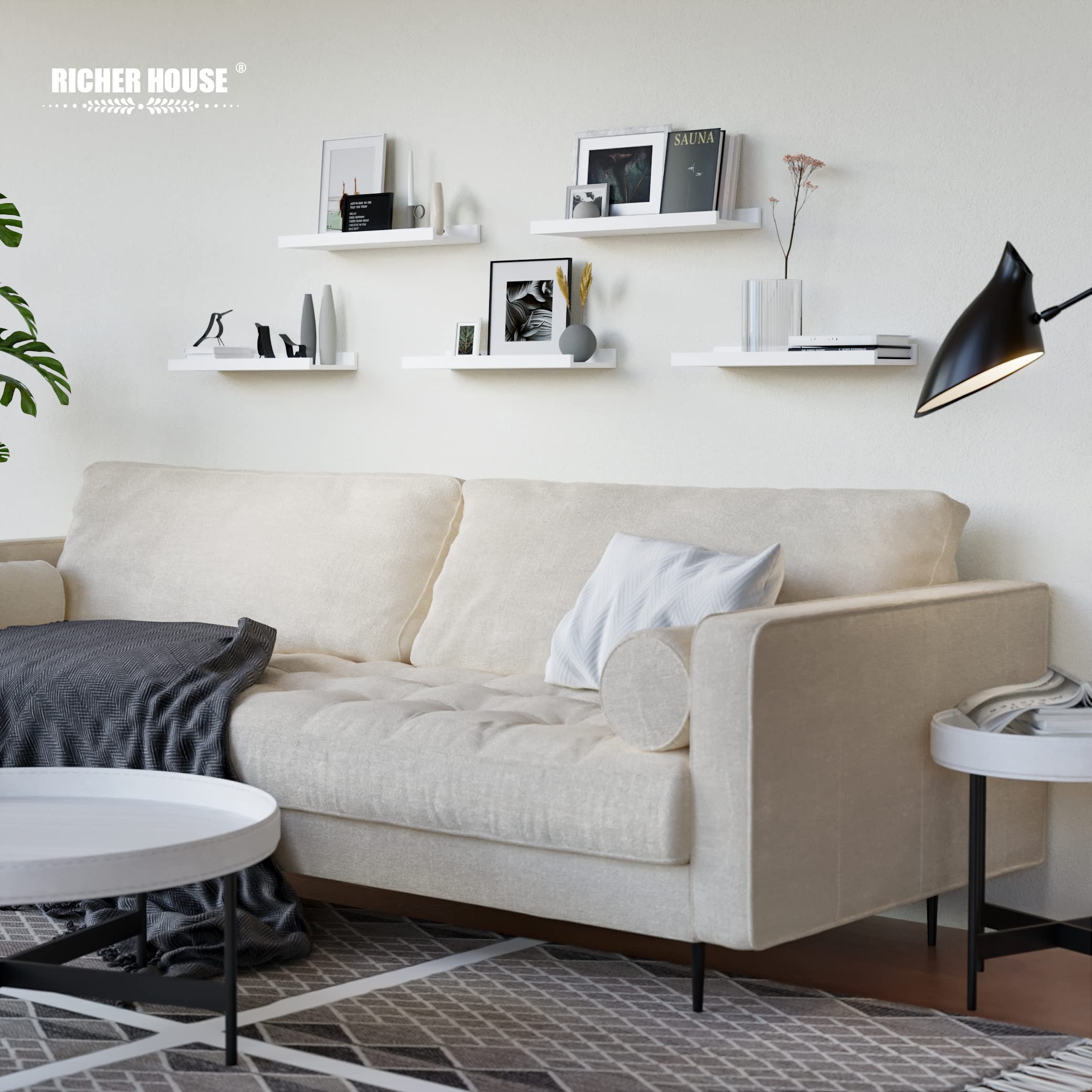 RICHER HOUSE gallery-style shelf arrangement creates balanced wall art in living spaces.