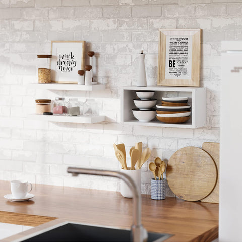 Richer House kitchen decor and storage with white floating shelves.